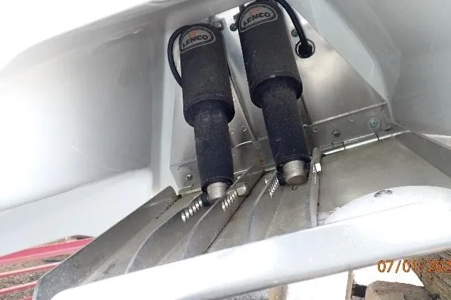 Slide: The Image of 2023 Cape Horn 34XS boat trim tabs with Lenco actuators, enhancing marine performance. - 15