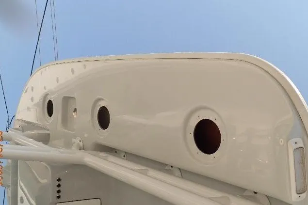 Slide: The Image of 2023 Cape Horn 34XS boat hull with circular openings, viewed from below. - 42