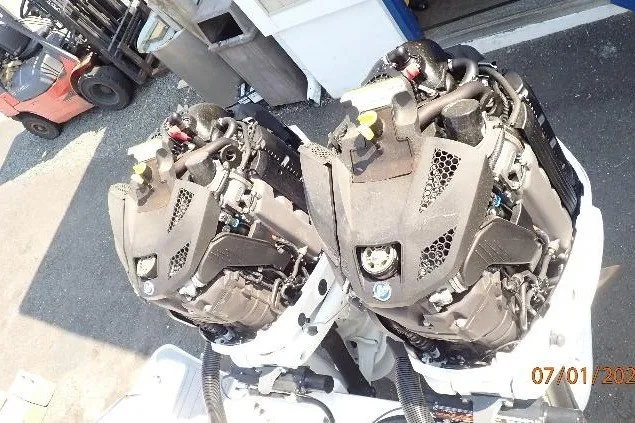 Slide: The Image of Twin engines on a 2023 Cape Horn 34XS boat, viewed from above. - 62
