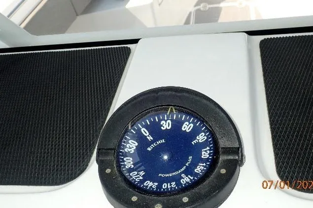 Slide: The Image of Compass on 2023 Cape Horn 34XS boat dashboard, displaying navigation degrees. - 41