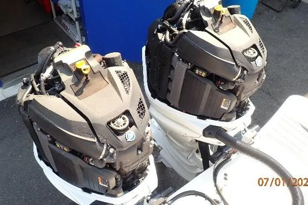 Slide: The Image of Twin outboard engines on a 2023 Cape Horn 34XS boat, viewed from above. - 61