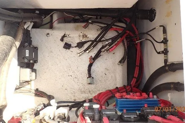 Slide: The Image of Electrical wiring and components inside a 2023 Cape Horn 34XS boat. - 29