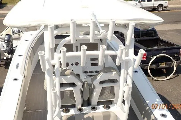 Slide: The Image of 2023 Cape Horn 34XS boat with rod holders and seating, viewed from above. - 59
