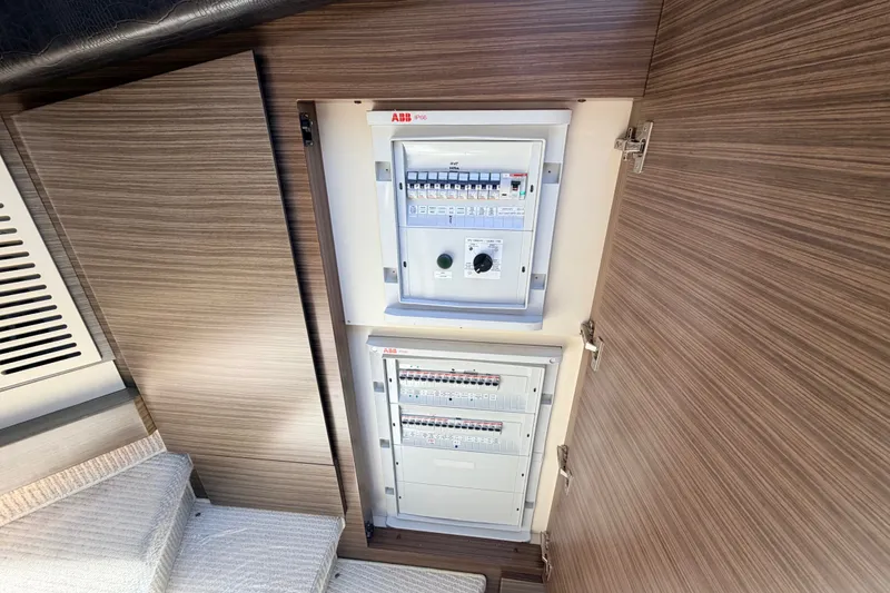 Slide: The Image of Electrical panel inside a 2014 Azimut 64 yacht, featuring ABB components. - 22