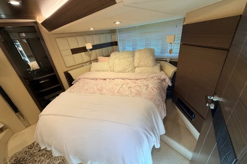 Slide: The Image of Luxurious bedroom interior of 2014 Azimut 64 yacht with plush bedding and modern design. - 32