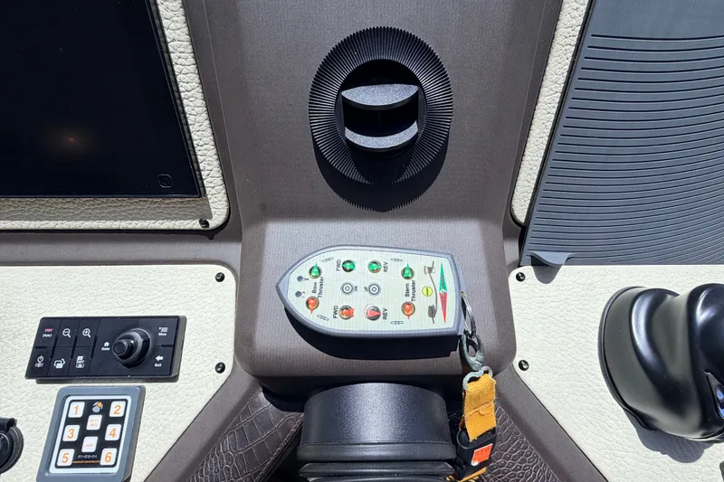 Slide: The Image of Control panel of a 2014 Azimut 64 yacht, featuring various switches and indicators. - 29