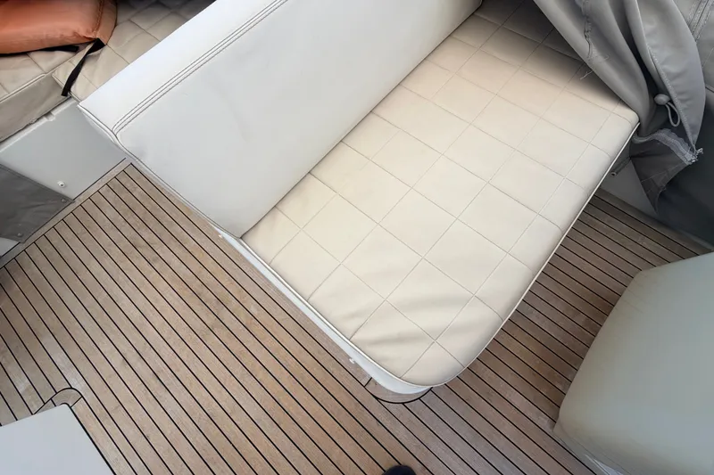 Slide: The Image of Luxurious seating and teak flooring on a 2014 Azimut 64 yacht. - 46
