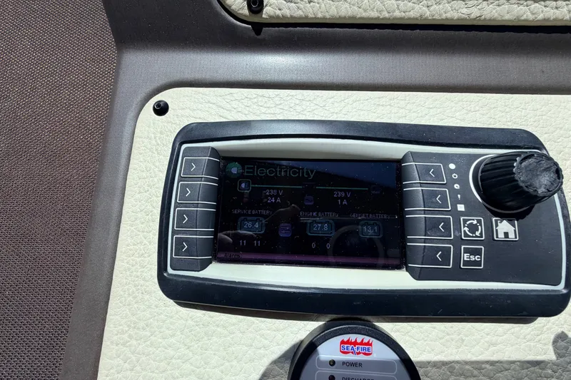 Slide: The Image of Control panel on a 2014 Azimut 64 yacht displaying electricity settings. - 28
