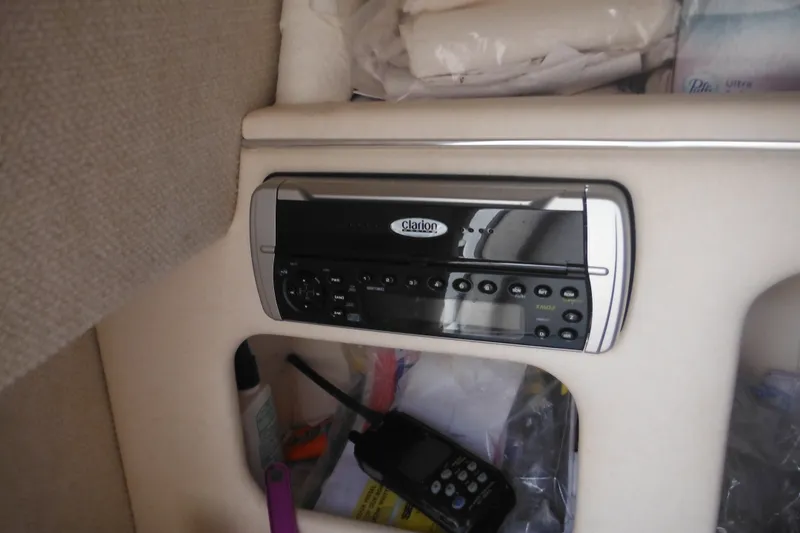 Slide: The Image of Clarion stereo system in 2004 Sea Ray 245 Weekender boat interior. - 44