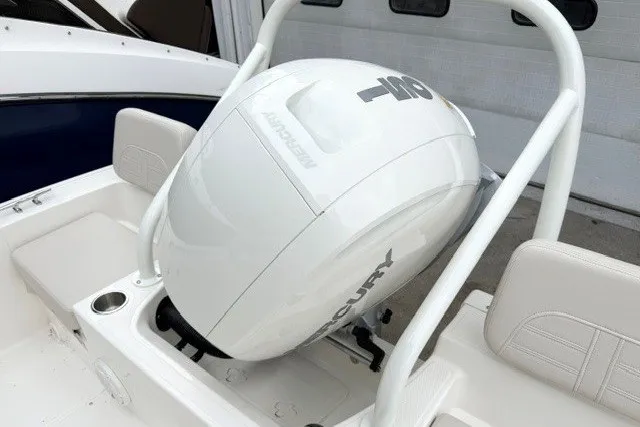 Slide: The Image of 2027 Boston Whaler 190 Montauk boat with Mercury outboard motor, white interior. - 9