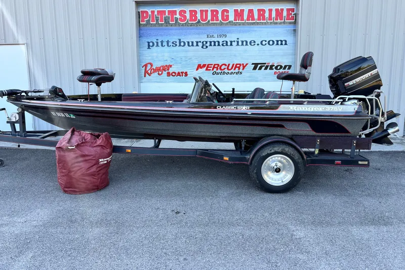 The Image of 1988 Ranger 375V boat on trailer at Pittsburg Marine dealership. - 0
