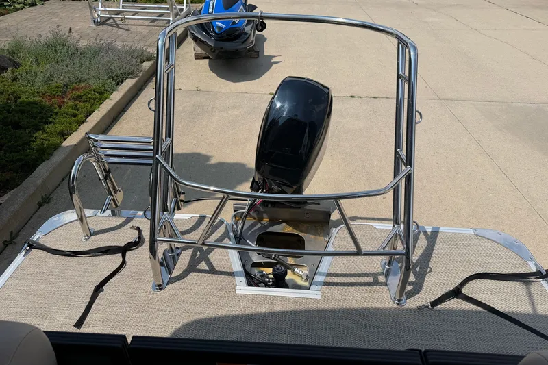 Slide: The Image of Pontoon boat rear view with motor, Crest Classic 200, 2025 model. - 13