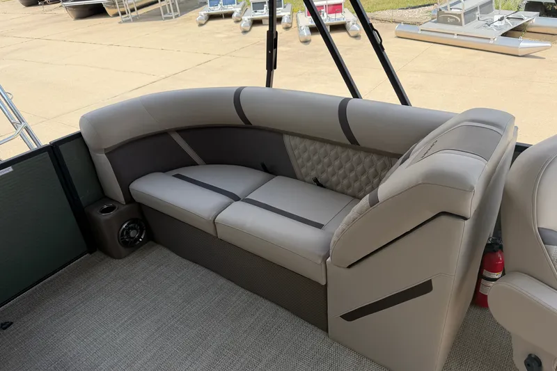 Slide: The Image of Luxurious seating on 2025 Crest Classic 200 pontoon boat, featuring elegant upholstery and modern design. - 10