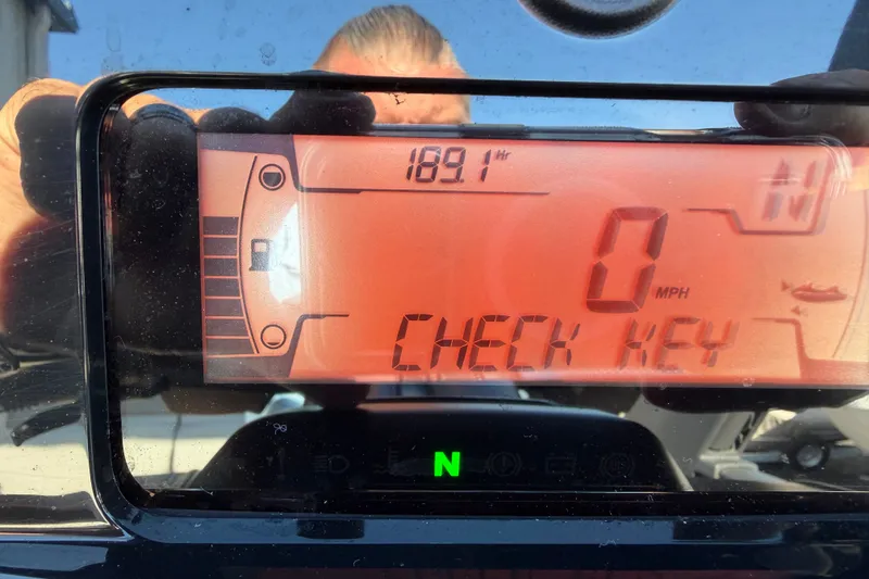 Slide: The Image of Dashboard of 2024 Sea-Doo Switch Compact showing "Check Key" message. - 5