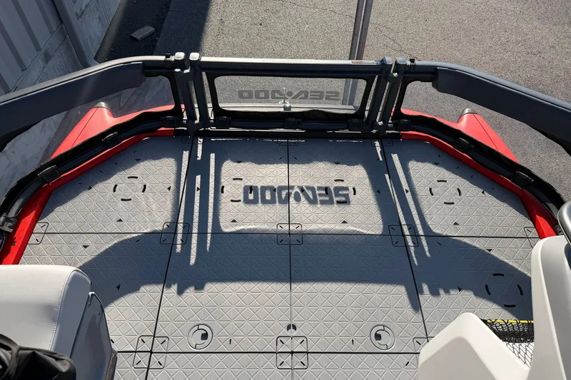 Slide: The Image of 2024 Sea-Doo Switch Compact deck with textured flooring and railing, viewed from above. - 11