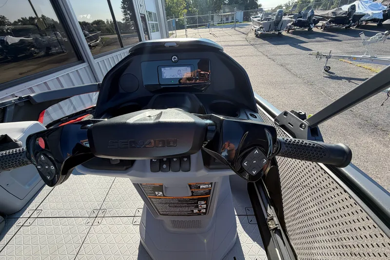 Slide: The Image of 2024 Sea-Doo Switch Compact dashboard with steering controls and digital display. - 10
