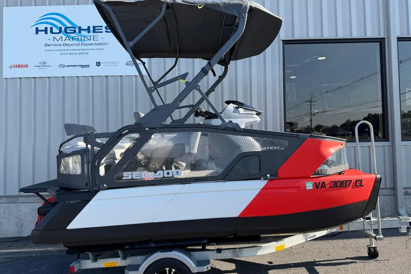 The Image of 2024 Sea-Doo Switch Compact boat on trailer at Hughes Marine dealership. - 1