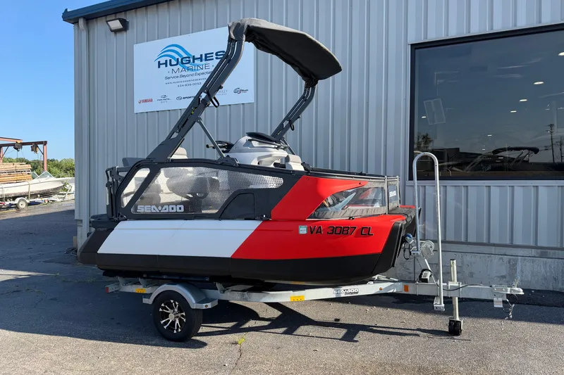 Slide: The Image of 2024 Sea-Doo Switch Compact on trailer outside Hughes Marine building. - 3