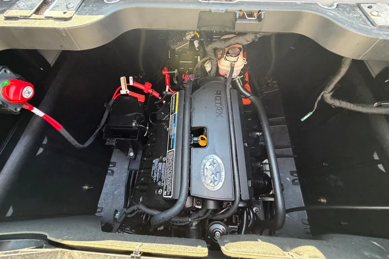 Slide: The Image of 2024 Sea-Doo Switch Compact engine compartment showcasing Rotax engine components. - 8