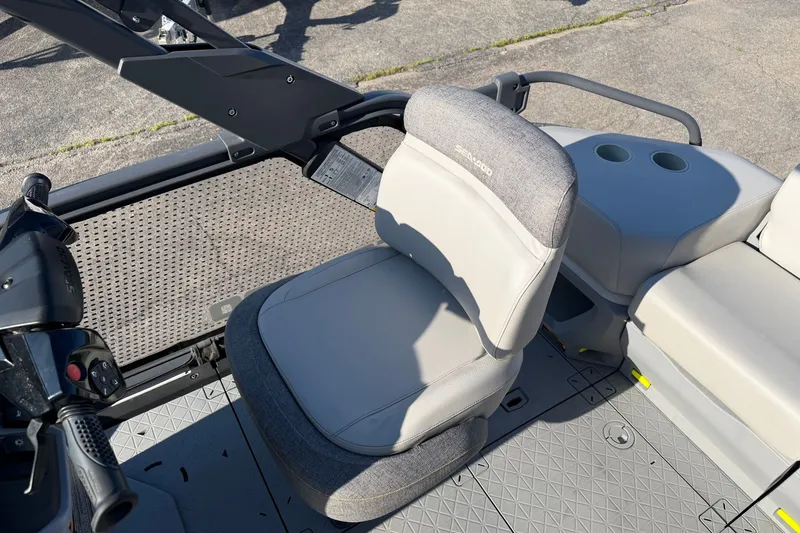 Slide: The Image of 2024 Sea-Doo Switch Compact interior with steering and seating details. - 9