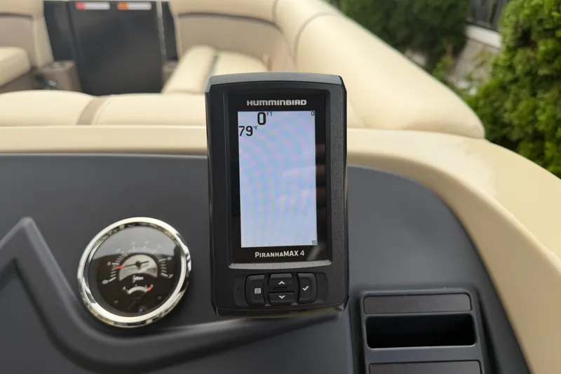 Slide: The Image of Humminbird PiranhaMAX 4 fish finder on 2023 Crest Classic LX 240 SLSC boat dashboard. - 13