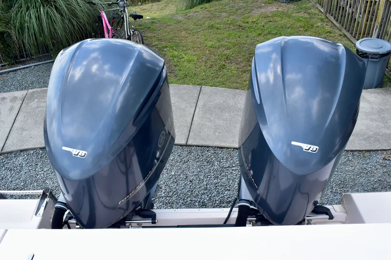 Slide: The Image of Twin Yamaha V8 outboard engines on a 2013 Grady-White Canyon 336 boat. - 24