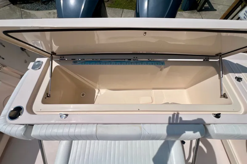 Slide: The Image of Open storage compartment on 2013 Grady-White Canyon 336 boat, showcasing interior space. - 41
