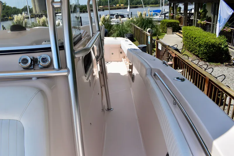 Slide: The Image of 2013 Grady-White Canyon 336 boat interior with dockside view. - 64