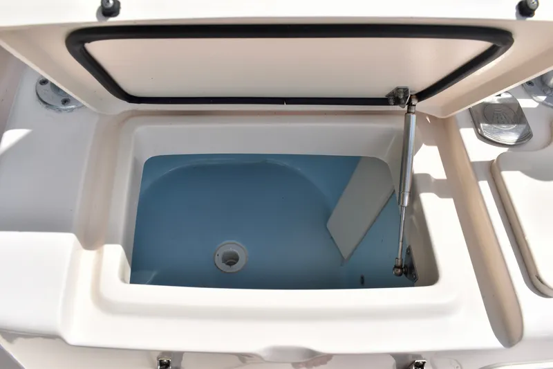 Slide: The Image of Open storage compartment on 2013 Grady-White Canyon 336 boat. - 20