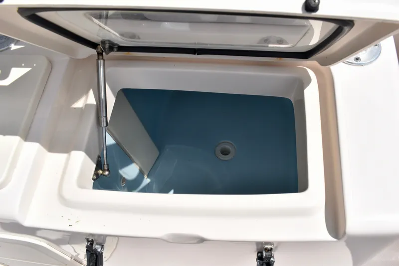 Slide: The Image of Open storage compartment on 2013 Grady-White Canyon 336 boat. - 77
