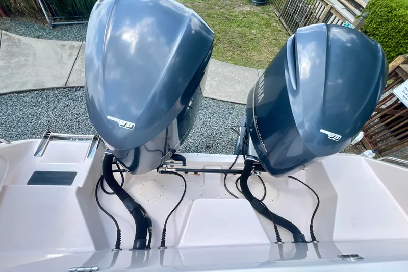 Slide: The Image of Twin Yamaha V8 outboard engines on a 2013 Grady-White Canyon 336 boat. - 48