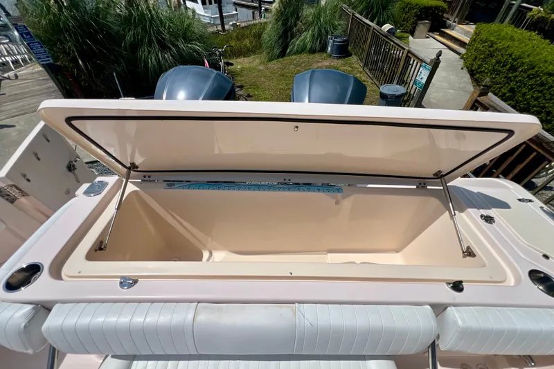 Slide: The Image of Open storage compartment on a 2013 Grady-White Canyon 336 boat. - 42