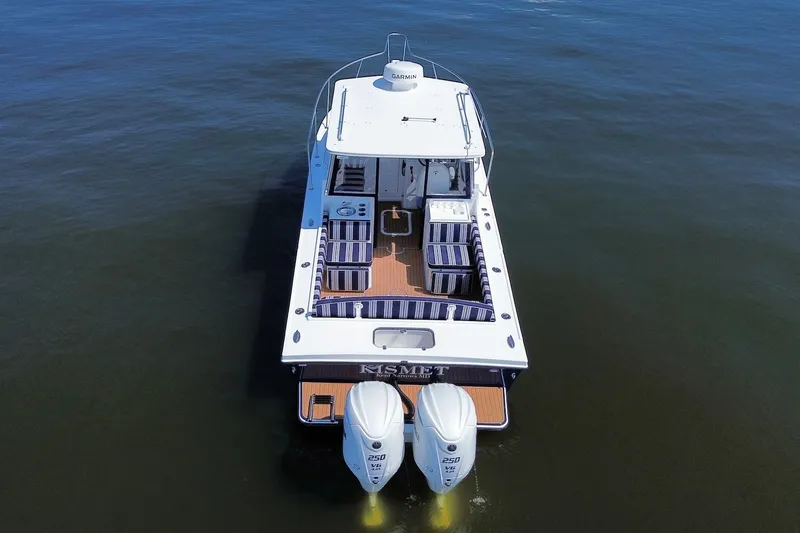Slide: The Image of Aerial view of 2026 Steiger Craft 28 Annapolis boat on calm water. - 9