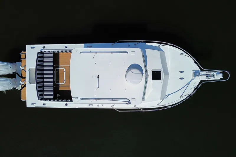 Slide: The Image of Top view of 2026 Steiger Craft 28 Annapolis boat with twin engines. - 8