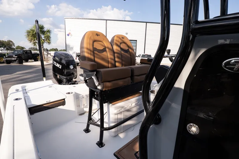 Slide: The Image of 2027 Sea Pro 230 Bay boat interior with Suzuki outboard motor. - 14