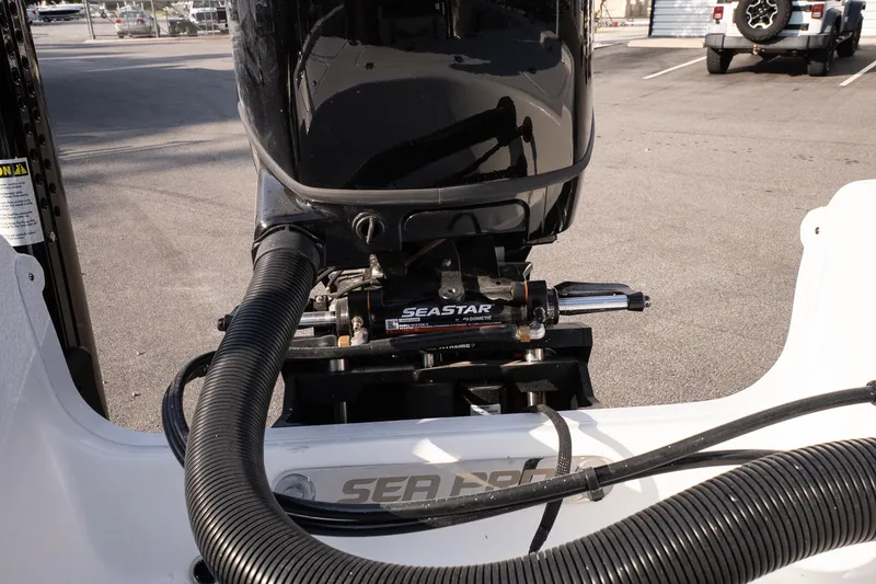 Slide: The Image of 2027 Sea Pro 230 Bay boat engine with SeaStar hydraulic steering system. - 17