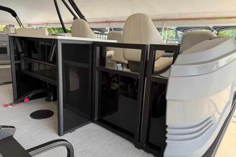 Slide: The Image of 2027 Sylvan R-20 PARTY FISH boat interior with seating and storage compartments. - 5