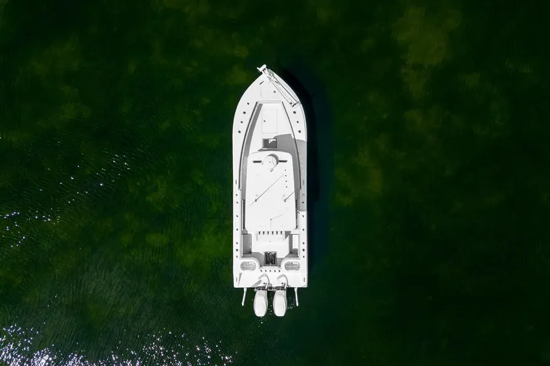 Slide: The Image of Aerial view of 2024 SeaHunter 28 Floridian boat on green water. - 7