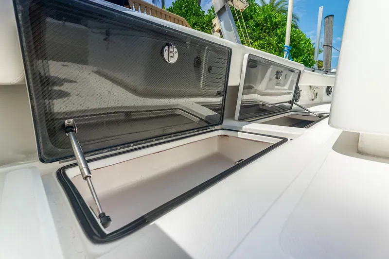 Slide: The Image of 2024 SeaHunter 28 Floridian boat storage compartments with sleek design and modern features. - 17
