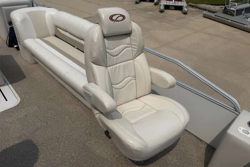 Slide: The Image of Luxurious seating on a 2008 Crest 25 II XRS boat, featuring plush white upholstery. - 4