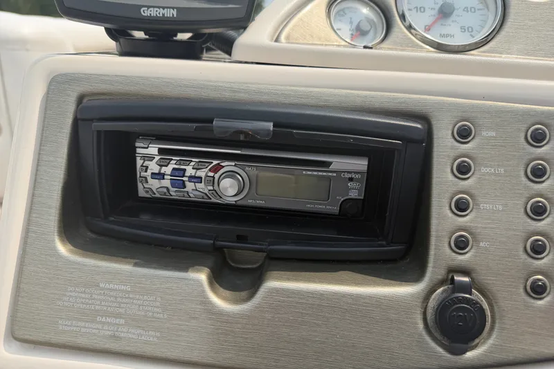 Slide: The Image of Dashboard of a 2008 Crest 25 II XRS boat with Clarion stereo system. - 19