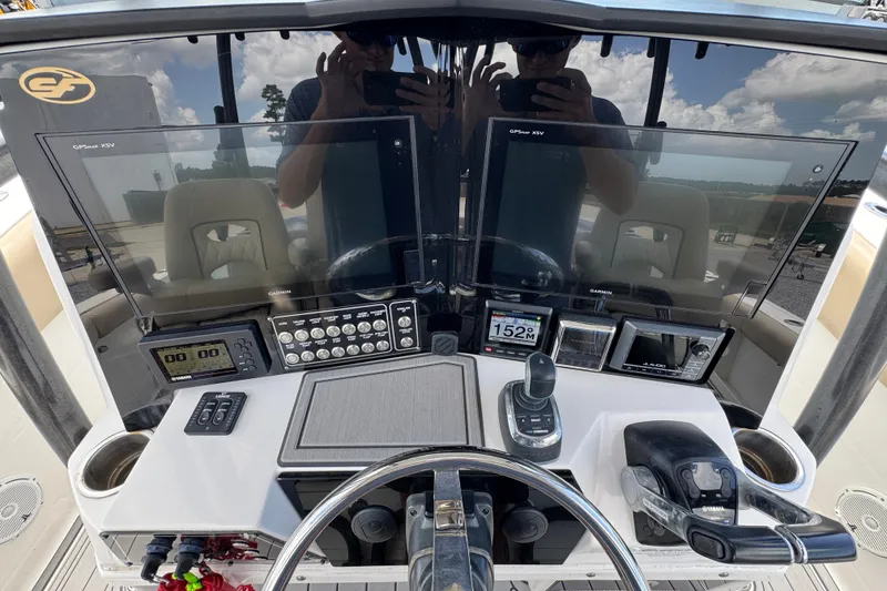 Slide: The Image of 2017 Sea Fox 328 Commander dashboard with advanced navigation and control systems. - 38