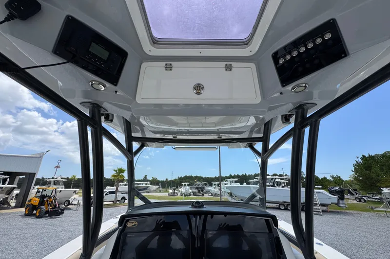 Slide: The Image of Interior view of 2017 Sea Fox 328 Commander boat with control panel and skylight. - 39
