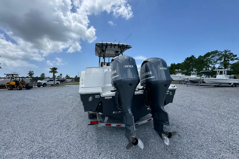 Slide: The Image of 2017 Sea Fox 328 Commander with twin Yamaha 300 engines on gravel lot. - 18