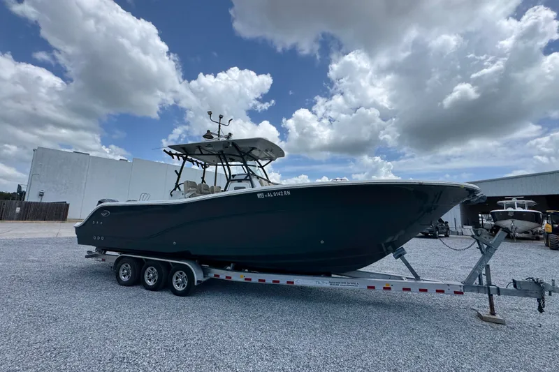 Slide: The Image of 2017 Sea Fox 328 Commander boat on trailer under cloudy sky. - 10