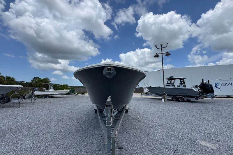 Slide: The Image of 2017 Sea Fox 328 Commander boat on trailer under cloudy sky. - 7