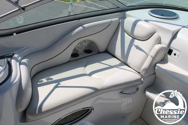 Slide: The Image of The image shows a luxurious, cushioned seat in a boat with gray leather upholstery. - 18