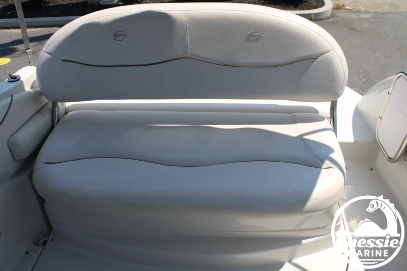 Slide: The Image of The image shows a white bench seat on a boat, likely in the aft area. - 15