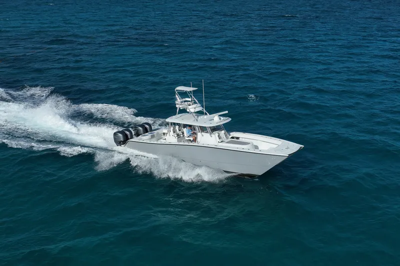 Slide: The Image of 2024 Freeman 42 boat cruising on open ocean waters. - 24