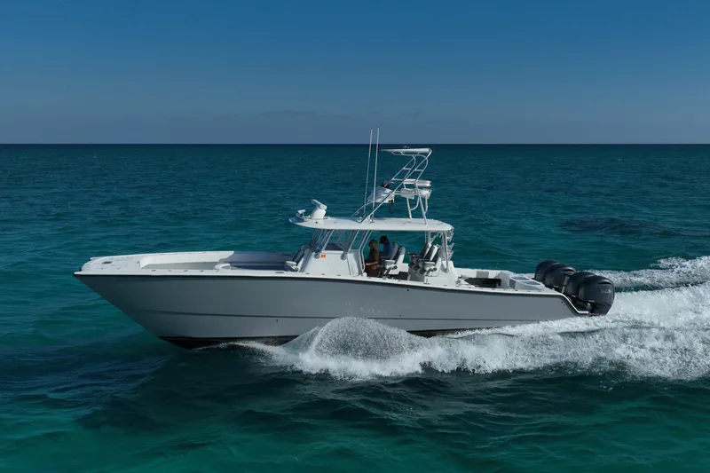 Slide: The Image of 2024 Freeman 42 boat cruising on open ocean waters. - 19